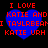 Four identical pixelated blue hearts with red text reading "I LOVE KATIE AND TAYLBEAM KATIE URH" on a black background.