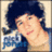 Pixelated image of a person with dark curly hair on a pink background with orange text reading 'thats mrs. nick jonas to you.<33'