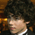 A pixelated image of a person with curly hair on the left, next to blue with text reading "wow, joe was right." and "Nick IS a stud muffin!"