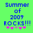 Green background with blue pixelated text reading 'Summer of 2009 ROCKS!!!' and five pink/purple star icons below.