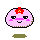 Two static pixel art frames of a pink rounded character with red flower accessory, black eyes, and green base on gray background.