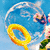 Animated icon shows a blue sky with white clouds, yellow ring floating near transparent bubble containing pink and green elements.