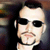 Animated contact sheet showing two frames of a pixelated image with a person wearing sunglasses and the text "CoolBuddy.com" on a blue background.