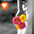 A static image shows a vertical arrangement of flowers with an orange heart icon in the top-left corner.