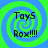 Four identical display a blue background with green spiral patterns and black text reading "ToyS Rox!!!" in pixelated font