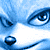 Pixelated blue-toned static icon showing a stylized face with large eyes, nose, and mouth against a light background.
