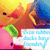 Pixelated image of a character with red hair and green eyes holding a white object with blue text, set against a gradient background of yellow, orange, and blue.
