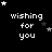 Black background with white pixelated text 'wishing for you' and scattered star symbols in various positions across the