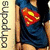 A pixelated image shows a person wearing a dark blue shirt with a red and yellow emblem on the chest, standing against a light background.