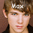 A pixelated image of a person with brown hair and blue eyes, wearing a dark shirt against a solid brown background.