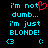 Pixelated text on black background with cyan and red elements, showing two side-by-side versions of the phrase "i'm not dumb... i'm just BLONDE!" accompanied by emoticons.
