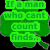 Green four-leaf clover with pixelated text reading "If a man who cant count finds... a four-leaf clover... is he lucky?" on a black background.