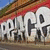 Animated sequence of stylized white text 'PRICE' with black inner details against a striped background, showing slight horizontal movement across frames.