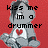Pixelated image of a gray cartoon character with a red heart on its chest, set against a red background with black text reading 'kiss me im a drummer'.
