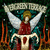 Pixelated angel figure with golden halo, red robe, white wings, holding banner above throne, set against dark green background with orange vertical lines.