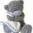 A pixelated grayscale figure with a white scarf and blue eyes, positioned next to blue text reading 'ZaraB' on a white background.