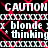 Black background with red diagonal lines and white text reading CAUTION, blonde x blonde, * thinking in a repeating pattern.