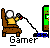 Pixel art icon of a person sitting in a chair holding a game controller connected to a TV, with the word "Gamer" below.