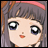 A pixelated anime-style character face with large eyes and a pink headband on the left, next to stylized text reading "Anime IM" and "COM" on a black background.