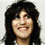 A person with long dark hair appears in three showing different expressions and clothing against varied backgrounds