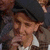 A pixelated image shows a person in a dark cap and brown jacket with text overlays reading "Yeah he was heah." and "But he put an egg in his shoe and... beat it!" on separate colored backgrounds.