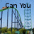 A pixelated image of a roller coaster with green tracks and blue supports, set against a light blue sky background.
