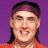 A 48x48 pixel animated buddy icon featuring a contact sheet layout with two frames: left frame shows a person in an orange shirt against purple background, right frame displays "ARRESTED DEVELOPMENT" text above a red house logo.
