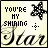Four- of pixelated text and symbols on a light background, with animated changes to the word 'SHINING' and small decorative elements