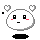 Pixelated white circular character with black eyes, red cheeks, and a small mouth; heart-shaped accents above head; black oval shape below face.