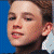 four pixelated headshots on blue backgrounds with three text displaying 'Down', 'Down On', and 'Down On Dream' in pink, and two showing 'Down On Dream Street' in pink and blue