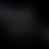 A static image with a dark gradient background transitioning from black to gray, showing no visible subjects or text.
