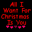 Red pixelated text on black background reads 'All I Want For Christmas Is You' with pink and purple star-like symbols below.