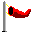 Red flag on gray pole with yellow accents, animated to wave left to right