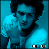 A four- shows a person with curly hair in a white shirt against a blue pixelated background, each displaying slight variations in hand position and facial expression