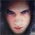 A static pixelated image of a person's face with light skin, dark hair, and blue eyes, showing a neutral expression with closed lips.