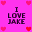 Pixelated pink background with four identical text blocks reading "I LOVE JAKE" surrounded by red and pink heart icons.
