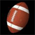 Pixelated brown football with white laces and stripes on a black background, rendered in low-resolution 256x256 pixels.