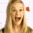 A 48x48 pixel animated buddy icon featuring a blonde woman with long hair and an open-mouthed smile on the left side, paired with green text reading "Original Icons .com" on a dark green background on the right side.
