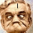A four- shows a pixelated face with changing text overlays: 'I', 'beached', 'him', and a blank