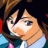 Pixelated anime-style character face with dark hair and blue eyes, wearing a light-colored top against a dark background.
