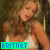 Two side-by-side pixelated images of a woman with long wavy hair in a white top, each displaying the text 'BRITNEY' at the bottom.