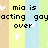 Pixelated text on a striped background with hearts, reading "mia is acting gay over what she doess alsooo ehn hate it bye <3".