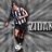 Pixelated static image of a soccer player in mid-kick with a ball, set against a gray background and partial text.