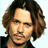Pixelated image of a person with shoulder-length brown hair, blue text reading 'Johnny Depp is my hubby' and 'we just don't know it yet. MaiCaAnG'