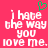 A static image with a bright pink background displays white pixelated text reading "i hate the way you love me." and a green pixelated heart symbol above the text.