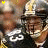 A football player in a black jersey with white number 63 and gold helmet appears across four , with yellow dots changing position between frames