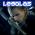 Pixelated image of a person with arms raised, wearing dark clothing against a black background, topped by blue text reading "Legolas" in white block letters.