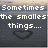 Pixelated text and heart symbol on a beach sunset background with gradient sky.