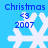 Four identical pixelated snowflake icons with blue text 'christmas <3 2007' on a light blue background, arranged in a pattern