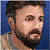 Pixelated close-up of a person with short dark hair, a beard, and a light-colored shirt against a blue background.